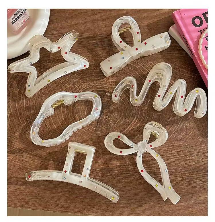 CuteHart Star Bow Shaped Hair Claw Clip - Sparkling Milky White Rhinestone Design 1pc 闪耀彩钻装饰的奶白色星形蝴蝶结抓夹