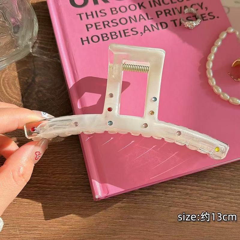 CuteHart Star Bow Shaped Hair Claw Clip - Sparkling Milky White Rhinestone Design 1pc 闪耀彩钻装饰的奶白色星形蝴蝶结抓夹